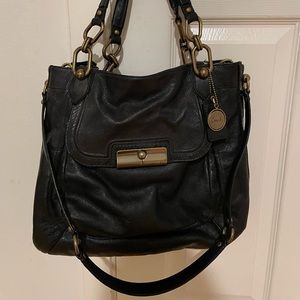 Limited edition COACH Kristin Elevated Black Leather Satchel with gold accents.